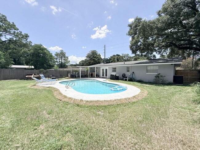 Building Photo - Renovated Pool Home with Private Backyard Oasis