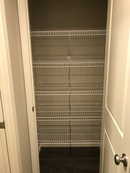 Linen closet on main level near laundry room - 5858 Lien Rd