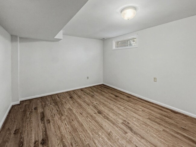 Building Photo - Furnished 4BD 2BA Home with Two kitchens, Basement, and Garage!