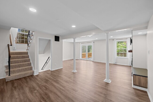 Building Photo - Completely Renovated Corner Townhome with Modern Kitchen, Designer Baths, and Private Yard