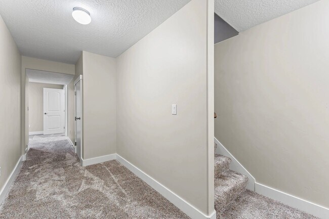 Building Photo - Upgraded 4-Bed Townhome with Finished Base...