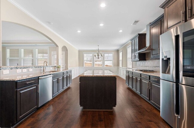 Building Photo - Luxurious 4-Bedroom Retreat with Third Floor Bonus Room & Fenced-in Backyard