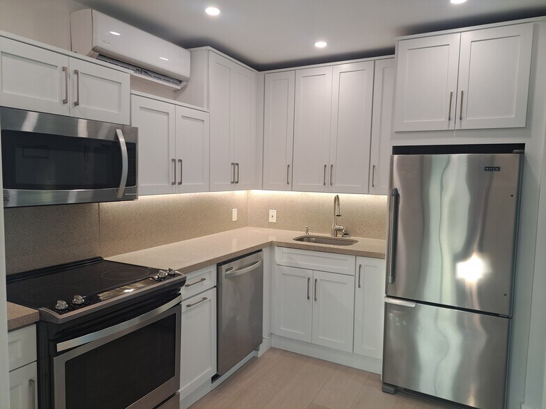 Modern kitchen with water filtration - 912 NE 81st St
