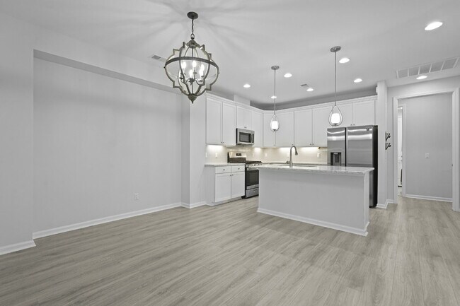 Building Photo - "Charming 2-Bedroom Retreat with 2 Baths and Den - 1558 Sq. Ft. of Comfort in Latitude Margaritav...