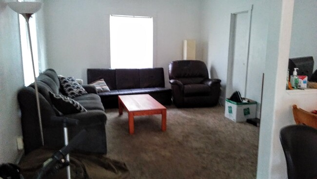 Living room (adjacent to kitchen and eating area - quite large). Heat pump is in this room - 804 NW 29th St