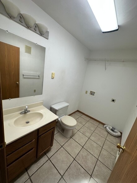 Half bath with utility hookups - 1056 Lakeshore Dr