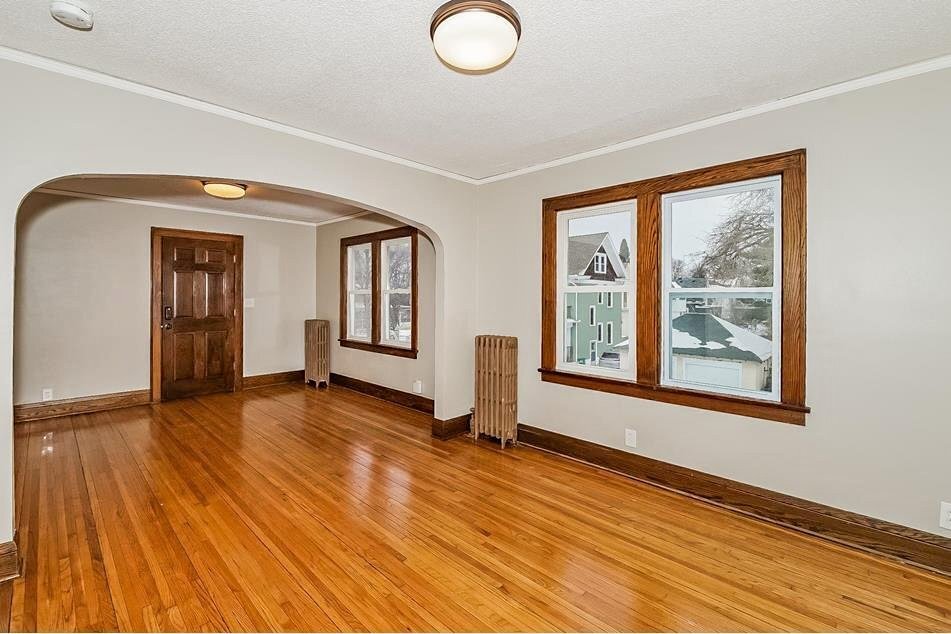 Dining & Living Room (Front Door pictured) - 2209 E 33rd St