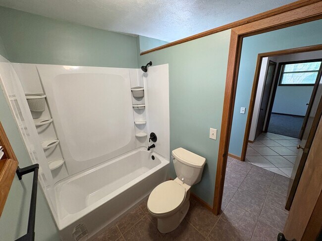 Building Photo - Spacious Home with Attached Garage & Fenced Backyard