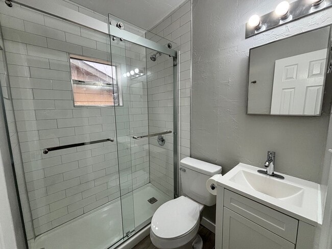 Building Photo - Remodeled 2 bedroom, 1 bathroom house with fenced yard and garage