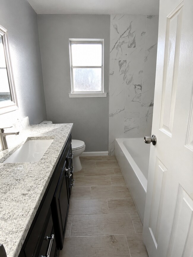 Building Photo - Freshly Renovated Home with HUGE backyard!