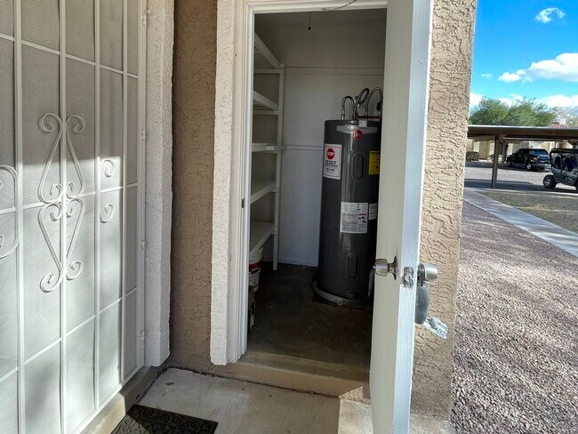 Entrance storage with water heater - 726 S Nebraska St