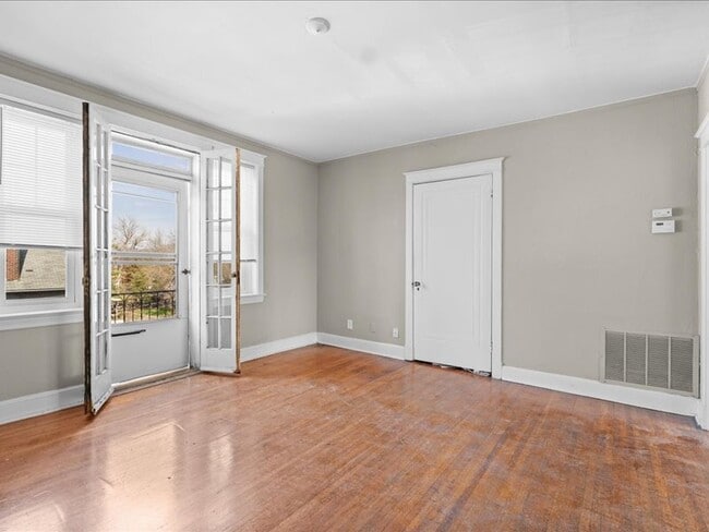 Building Photo - 7204 Zephyr Place - 2E