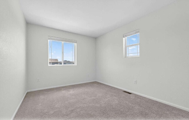 Building Photo - Beautiful 3 bed, 3 bath townhome in the lovely Painted Prairie Community!