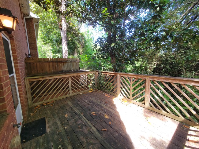 Screen door and a spigot on the private deck - 205 Woodstone Dr