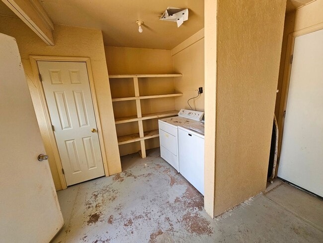 Building Photo - Property with a carport and laundry.