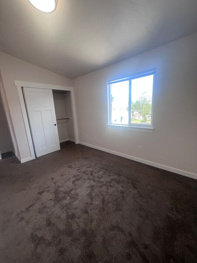 Building Photo - 2 Bedroom 1 bath house with extra large double car garage and extra storage space!