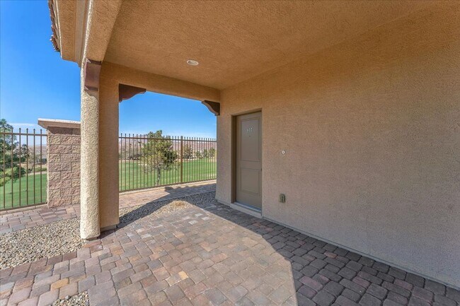 Building Photo - 4-Bedroom Tuscany Townhome with Strip & Golf Course Views