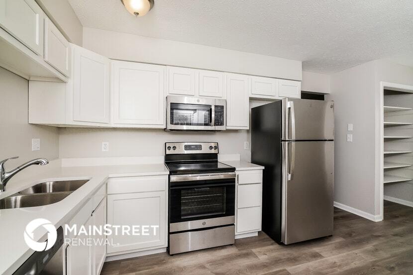 Building Photo - 1303 Woodcreek Dr