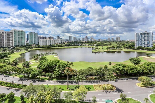 Building Photo - 3675 N Country Club Dr