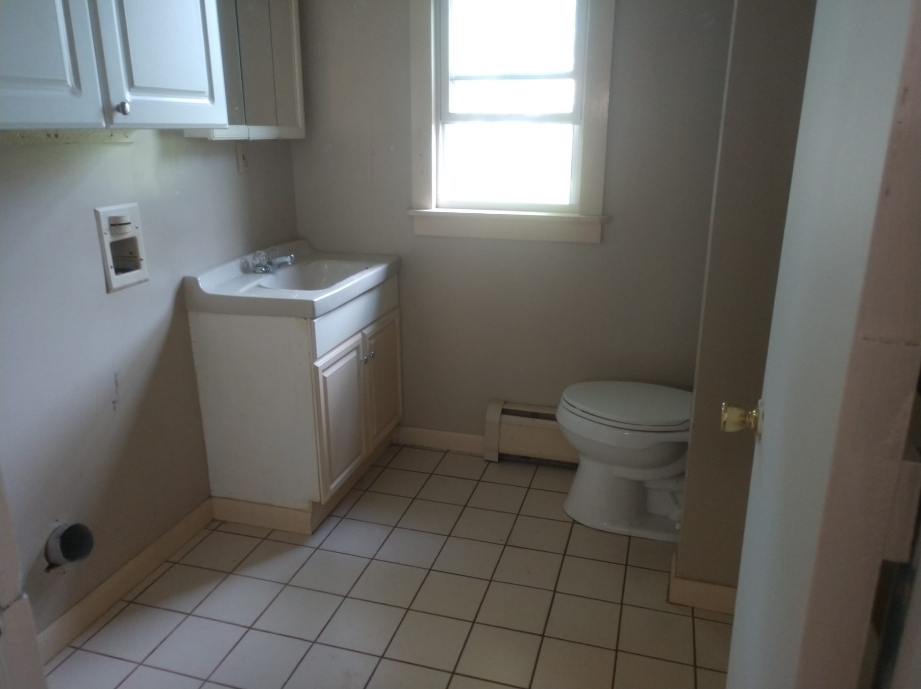 Bathroom with space for washer and dryer. - 122 Dewey avenue