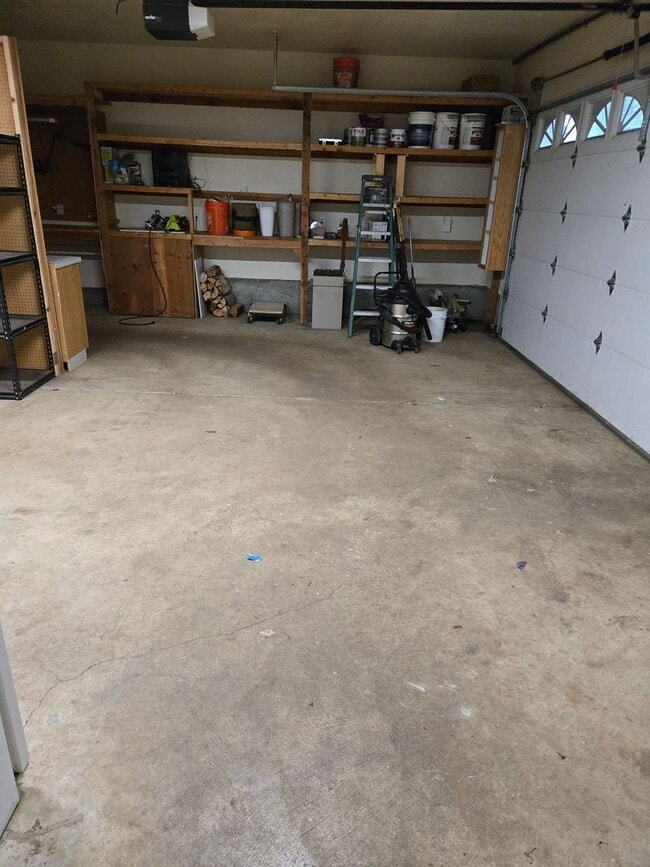 Building Photo - Large lot with tons of storage !  3 br , 2 bth + office+ 2  Car-garage + 2 Wooden Sheds