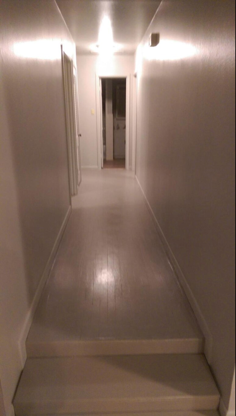 Hallway (hardwood floors with gray sealer) - 4016 46th St
