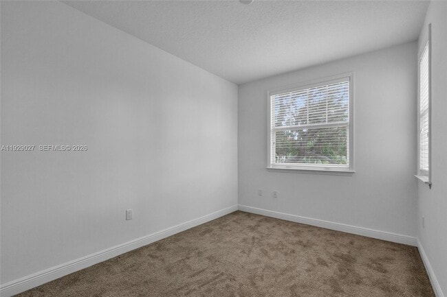 Building Photo - 4088 W Palm Aire Dr