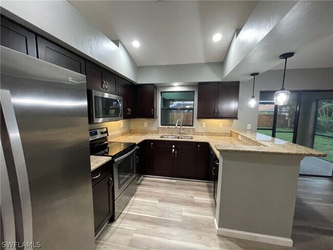 Building Photo - Beautiful 3/2/2- NE Cape Coral- SEE IT TODAY!