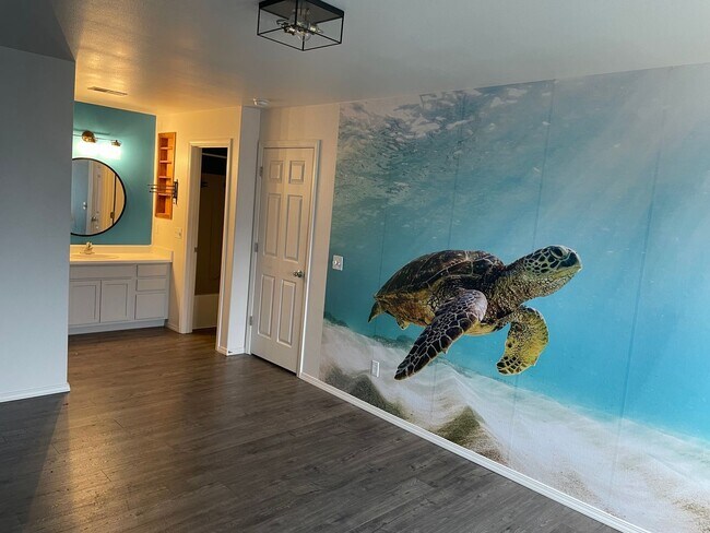 Building Photo - Spacious and well-maintained 3-bedroom, 2-bathroom condo