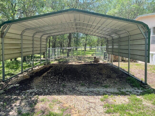 Building Photo - 3 bed 2 bath on one acre lot. New vinyl flooring throughout.