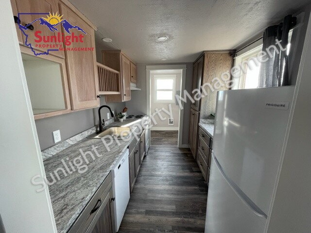 Building Photo - "Charming 1-Bedroom Retreat in Laurel - Cozy 576 Sq Ft Home!"
