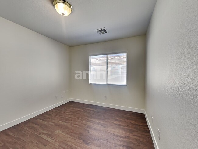 Building Photo - 10749 Artesia Wells St