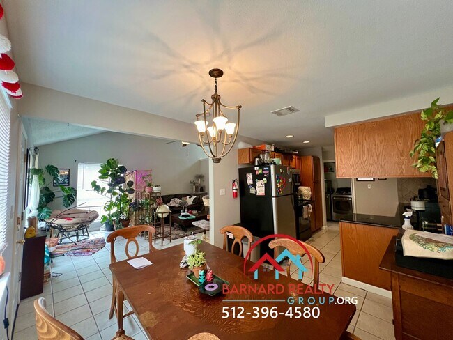 Building Photo - Available July 18: 3 bedroom, 2.5 Bath Duplex with Garage and Fenced Yard