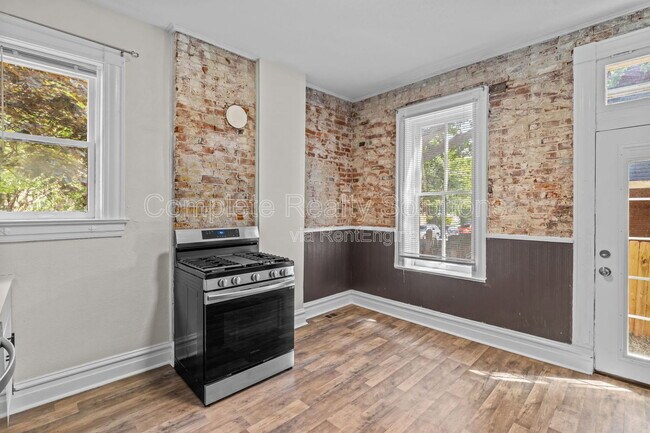 Building Photo - 3402 Dunnica Ave