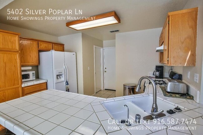 Building Photo - 5402 Silver Poplar Ln