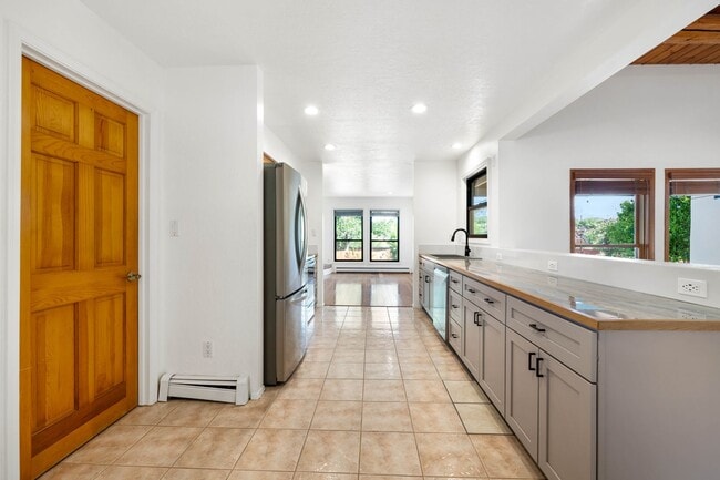 Building Photo - NEW MOVE-IN SPECIAL! Vibrant Home Off Rode...