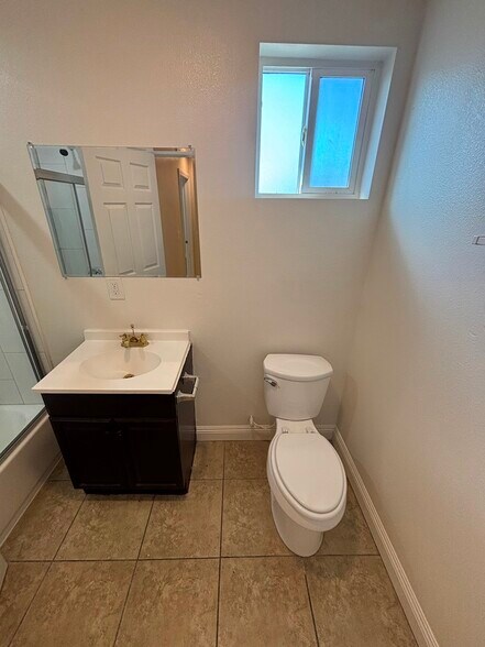 Building Photo - 1029 W 65th Pl