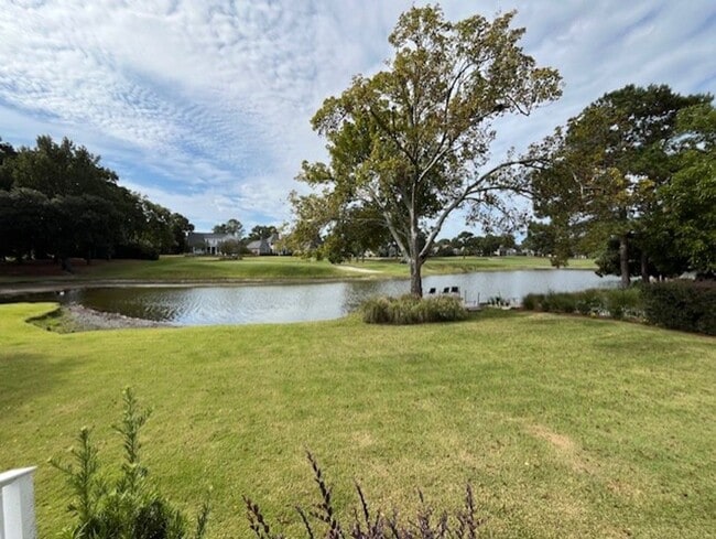 Building Photo - Welcome to Elegant Living in the Charming Porters Neck Plantation Community!