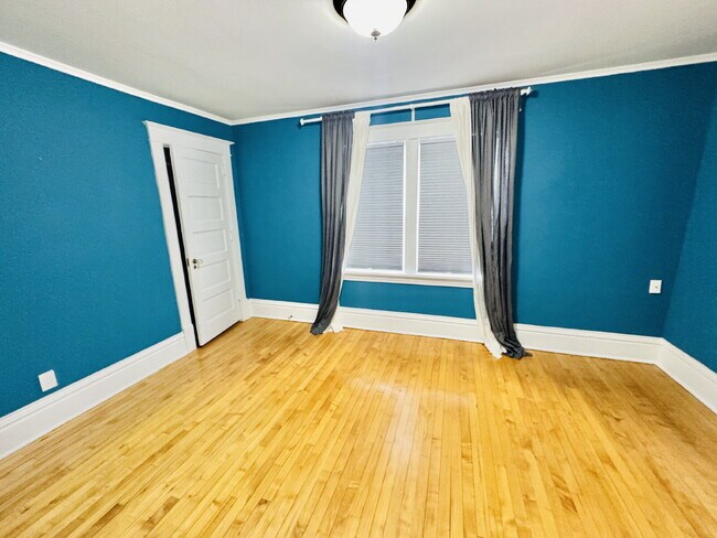 Building Photo - Charming 3-Bedroom Oasis with Elegant Touches & Finished Basement on Washburn Ave!