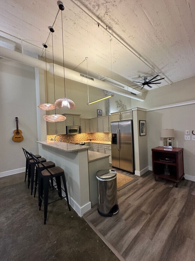 Building Photo - 1 BR/ 1BA at The Lofts with GATED GARAGE P...