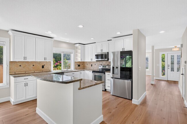 Building Photo - Beautifully Refreshed Clackamas Home with Bright Interiors & Private Backyard Retreat