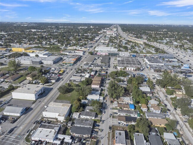 Building Photo - 6940 NW 6th Ct