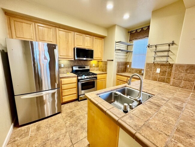 Building Photo - Located in a peaceful and well-maintained senior community, this spacious 3-bedroom, 3.5-bath Plu...