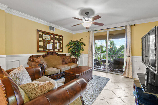 furnished living room - 6450 Emerald Dunes Dr