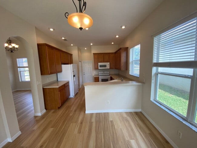 Building Photo - ANNUAL Lease – Unfurnished – Golf Course Lot - Designer Home in the highly sought-after gated com...