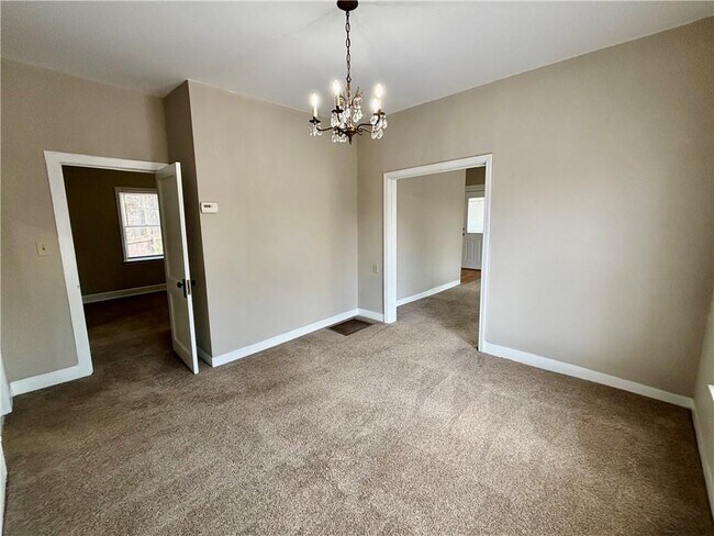 Building Photo - 3302 N Bogan Rd NE