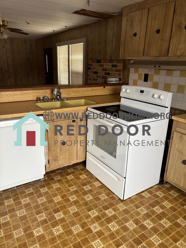 Building Photo - Three-Bedroom Double Wide with Fenced Yard