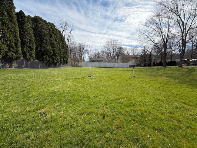 Building Photo - Goodyear Heights Gem with Fireplace, Attached Garage & Massive Backyard