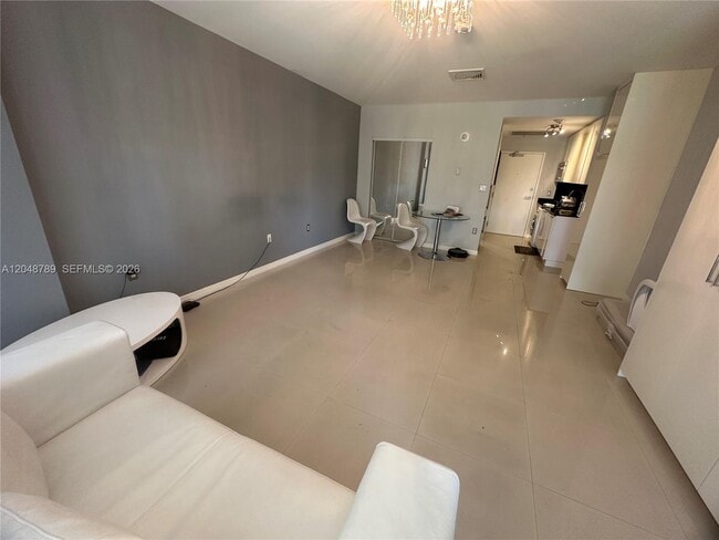 Building Photo - 10275 Collins Ave