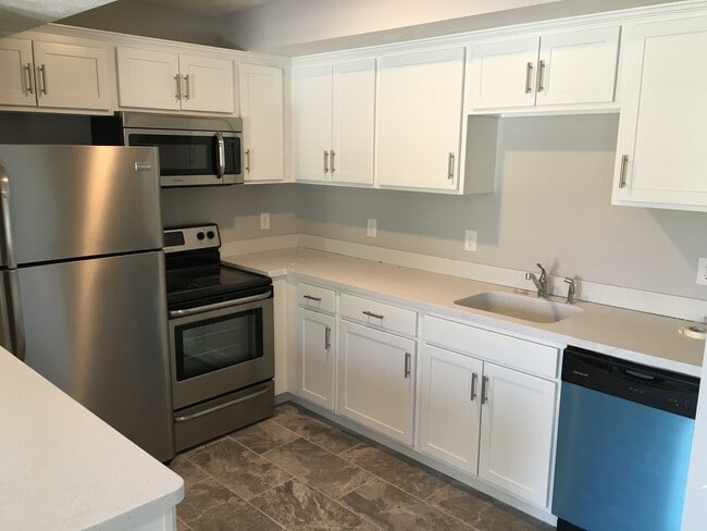 Building Photo - Modern One Bedroom Duplex at the Cottages -- A must-see!.